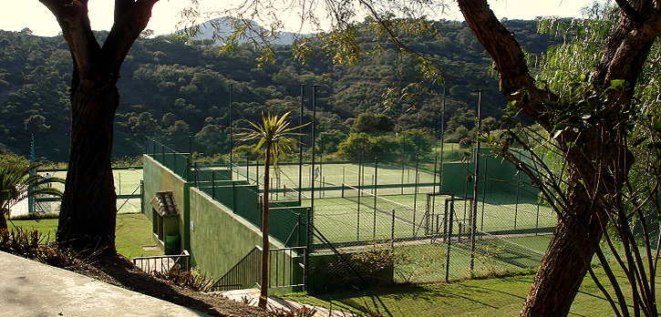 The two art lawn tennis courts are at the clubhouse of the Los Arqueros Golf Club.